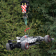 A crane removes Denmark driver Kevin Magnussen’s Haas car from the the track during the second practice session for Sunday’s Formula One Italian Grand Prix, at the Monza racetrack, Italy, Friday, Sept. 1, 2017. (AP Photo/Antonio Calanni)